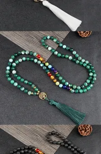Stylish beaded multi-layer bracelet necklace featuring tree of life pendant and tassel.