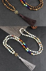 Multi-layer beaded bracelet necklace with tree of life pendant and tassel chakra stone details.