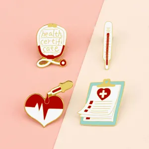 Cute medical enamel pins set featuring stethoscope, thermometer, heart, and clipboard.