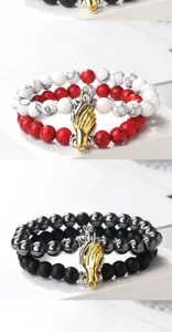 Magnetic handshake couple bracelet set featuring multi-layer beaded design with gold and silver hands.