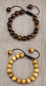 Verstellbares Holzperlenarmband mit schwarzem Kordel, natuerliche Holzmaserung Unisex Armband Detail.