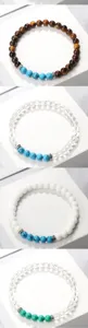 Bracelet de perles minimaliste 6mm en pierre naturelle turquoise et design unisexe.