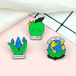 Lot de jolies broches en émail écologique avec motifs de pomme goutte d'eau et terre pour vêtements.