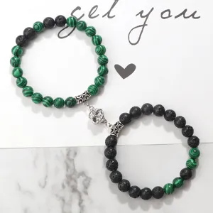 Ensemble de bracelets de couple magnétiques avec perles en malachite verte et pierre de lave.
