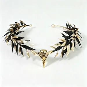 Baroque gothic crow skull headband detail view, black and gold leaf metal hair accessory.