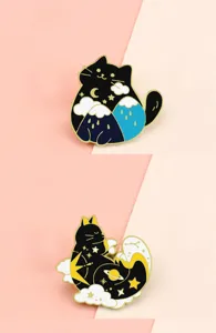 Exquisite black cat enamel pin with celestial cosmos and mountain designs, cute metal lapel badge.