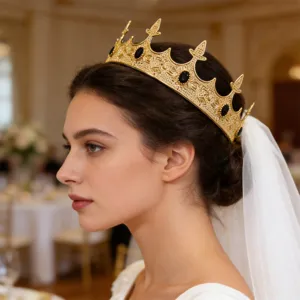 Gold crown with black stones and veil, exquisite detail close-up for wedding and party wear.