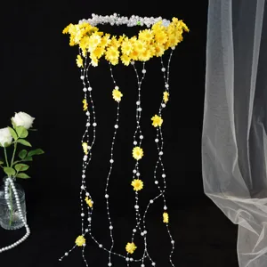 Daisy flower crown with pearl tassels, bohemian wedding hair accessory for beach vacation.