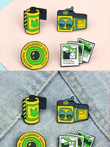 Detailed close-up view of retro camera film roll and polaroid photo enamel lapel pin set.