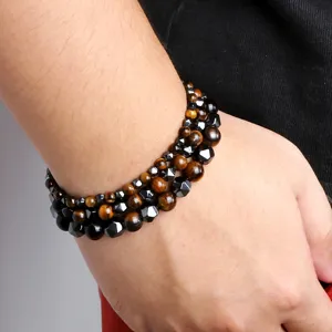 Pulsera elastica multicapa para hombre hecha de ojo de tigre y cuentas de hematites.