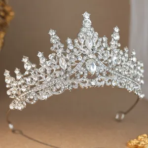 Sparkling silver rhinestone bridal tiara crown detail for wedding party princess hair accessory.