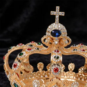 Detailed close-up of a luxury gold-plated court crown with sparkling rhinestones and gems.