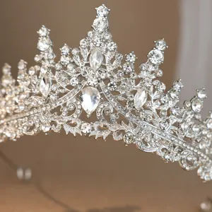 Close up detail of a sparkling silver rhinestone tiara, bridal wedding princess hair accessory.