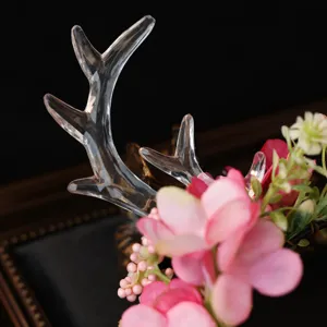 Fairy forest style clear deer antler headband with pink flowers and berries for Christmas party.