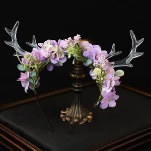 Forest style deer antler flower headband, fairy elf hair accessory for Christmas holiday party.