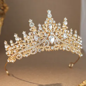 Exquisite gold rhinestone tiara detail, sparkling crystal bridal hair accessory for weddings.