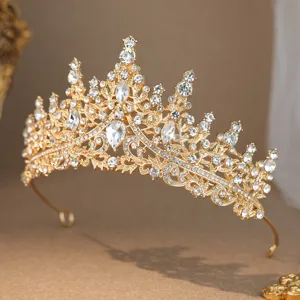 Exquisite gold rhinestone bridal crown tiara detail, elegant princess hair accessory.