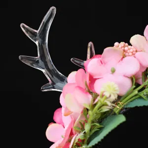 Detailed close-up view of the forest style deer antler flower headband with pink floral details.