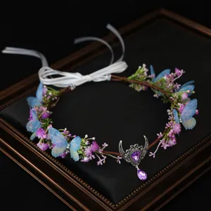 Exquisite elven flower crown with blue butterflies and crystal drop for wedding cosplay.