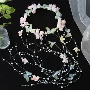 Handmade floral pearl headband bridal hair accessory with butterfly tassel wedding hairpiece for women.