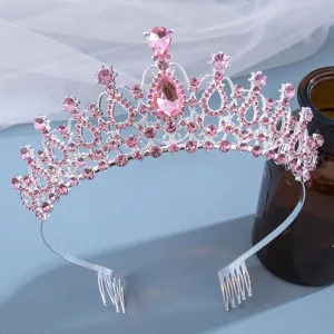 Exquisite silver pink rhinestone crown tiara detail, perfect for bridal wedding hair accessories.