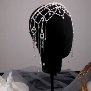 Elegant handmade pearl mesh headband with tassel forehead chain for evening party dress.