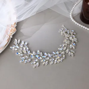 Close-up detail shot of sparkling crystal rhinestone leaf bridal hair vine accessory.