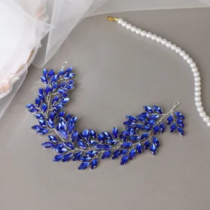 Detailed view of the elegant blue rhinestone leaf hair vine, perfect for bridal wedding updo styling.