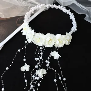 Handmade pearl floral headband wedding hair accessory with tassel chains for bridal styling.