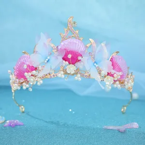 Ocean style pink shell blue butterfly tiara detail, rhinestone pearl wedding hair accessory.