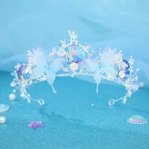 Ocean style princess crown headband with blue butterfly and shell rhinestones for wedding.