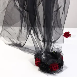 Gothic black mesh veil and red rose floral headband detail shot for Halloween party props.