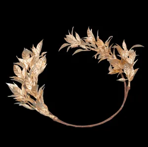 Golden leaf bridal wreath headband for wedding hair styling and elegant updo accessories.