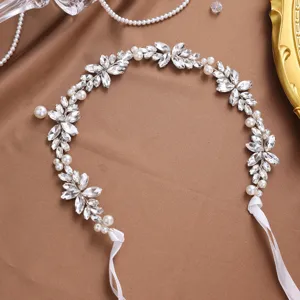 Exquisite rhinestone leaf bridal hair vine detail shot, elegant wedding accessory.