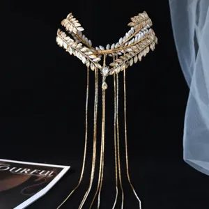 Diadema de novia de hoja de cristal dorado con largas cadenas de borlas para bodas elegantes y fiestas.
