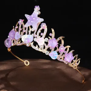 Handmade ocean themed tiara crown with purple starfish, shells, and rhinestones for girls.