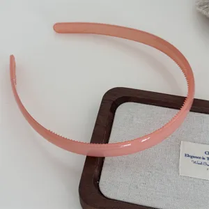 Jelly color plastic headband for women and girls, anti-slip teeth hair hoop daily accessory.