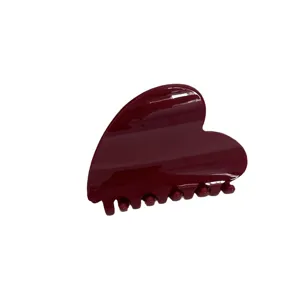 Red heart-shaped hair claw clip, elegant sweet style shark clip for women and girls daily hair styling.