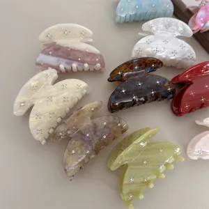 Colorful acetate hair claw clip with crystal rhinestones, vintage half-circle design for women.