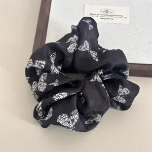 Black floral hair scrunchie for women, elegant butterfly print hair tie for daily wear stylish.