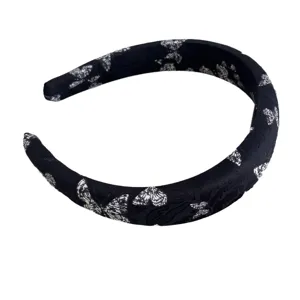 Black wide sponge headband with white butterfly print, high crown hair accessory for women.
