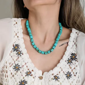 Detailed shot of turquoise beaded necklace featuring blocky turquoise stones for women.
