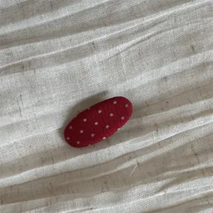 Red polka dot fabric hair clip sweet snap clip cute bangs hair accessory detail view