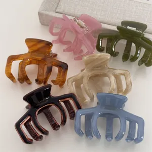 Ensemble de pinces à cheveux en acétate coloré pour un style élégant et quotidien.