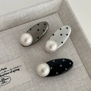 Chic black and white polka dot hair clips with large faux pearl accent, cute side duckbill pins.