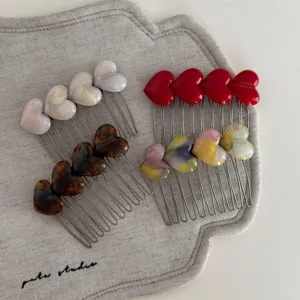 Sweet heart hair comb and side hair clip with colorful resin hearts and metallic teeth.
