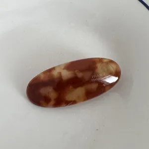Elegante fermaglio per capelli ovale in acetato francese, clip becco d'anatra tartaruga per dettagli.