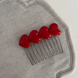 Red heart hair comb clip, sweet style metal side comb hair accessories detail shot.