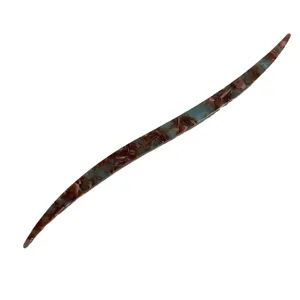 Elegant acetate hair stick with unique tortoiseshell pattern, ideal for chic lazy hair styling.