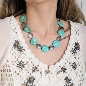 Boho turquoise beaded necklace with carved metal spacer beads, ethnic style collar jewelry.